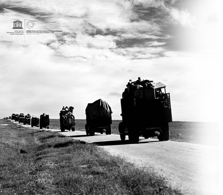 Historic photo of refugee trucks on a road